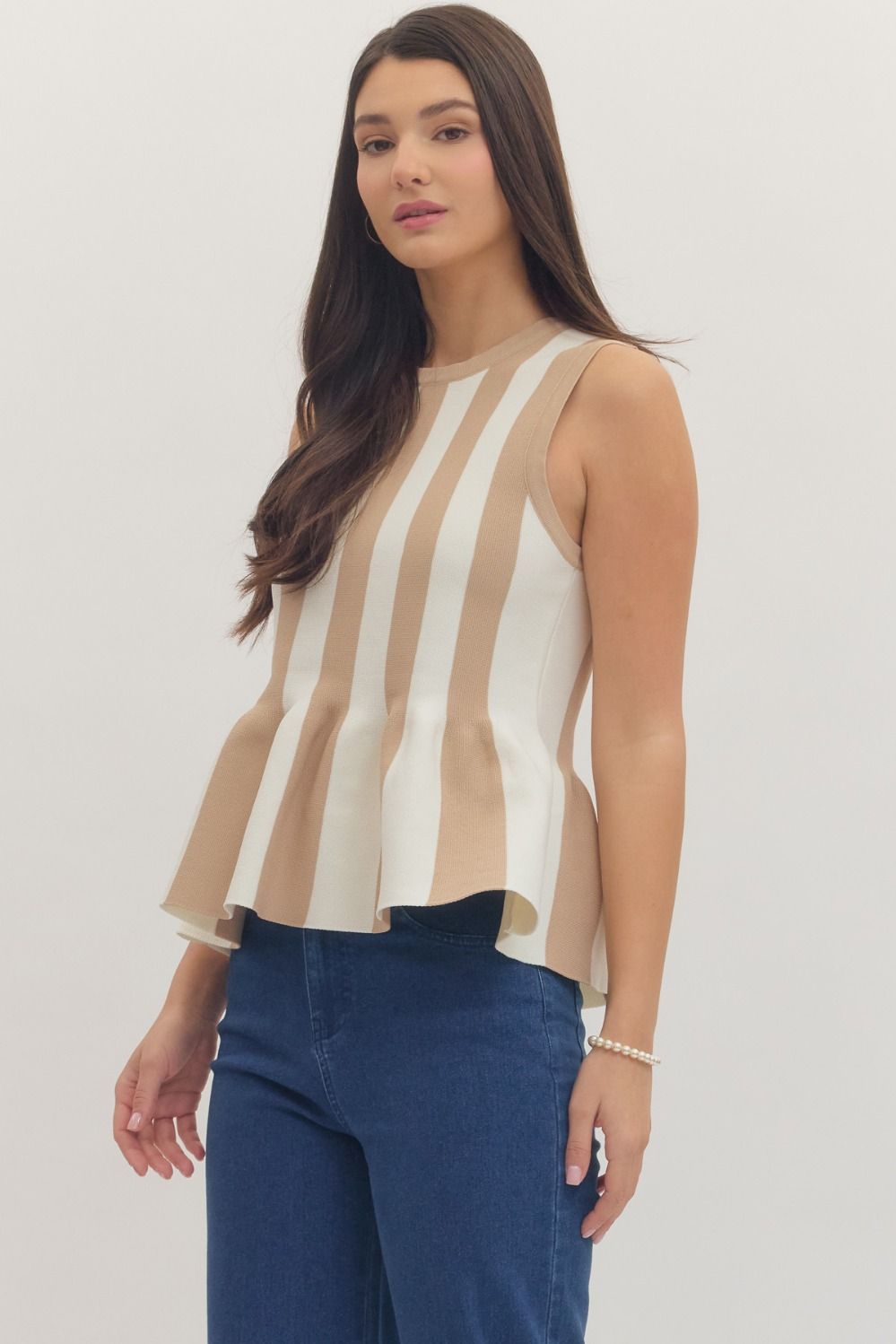 Striped sleeveless peplum knit top