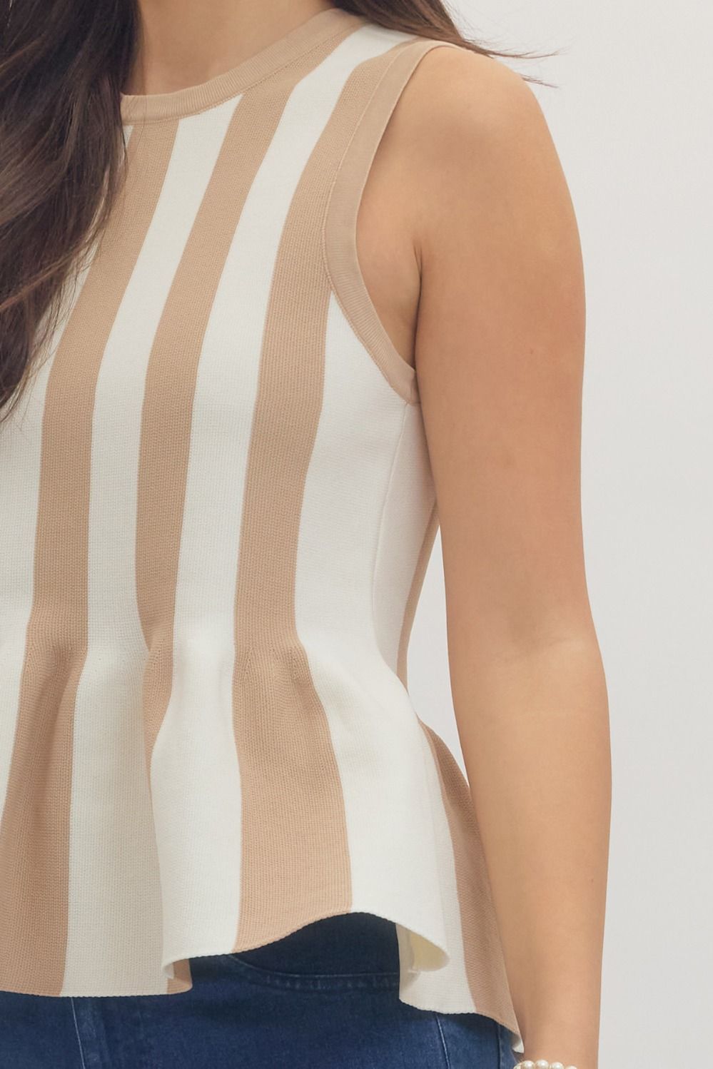 Striped sleeveless peplum knit top